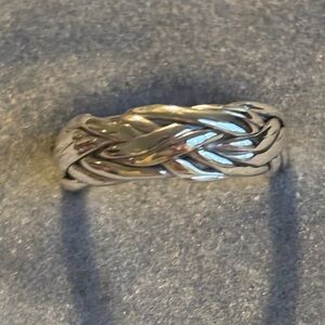 Elegant Silver Braided Ring Sz.7 has open seam on inside of ring but not outside